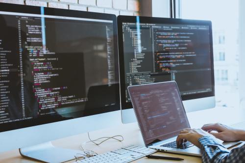 Computers showing coding