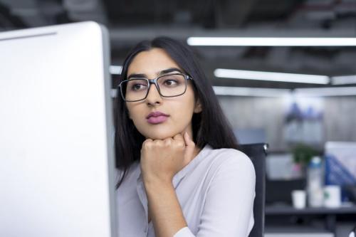 A data science student at a computer